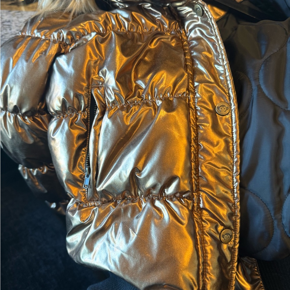 Girls lightly used puffer coat.